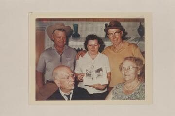 Dock Marston and Pearl Baker with members of the Busenbark family.  Green River, Utah.  At the first sale of Pearl's book, "Trail on the Water."