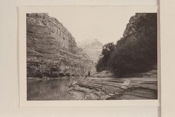 From Mile 186.5 in Cataract Canyon during cruise from Potash to the foot of Narrow Canyon. The caption on the back reads, "Looking upstream from Camp 4 Mile 186.5"